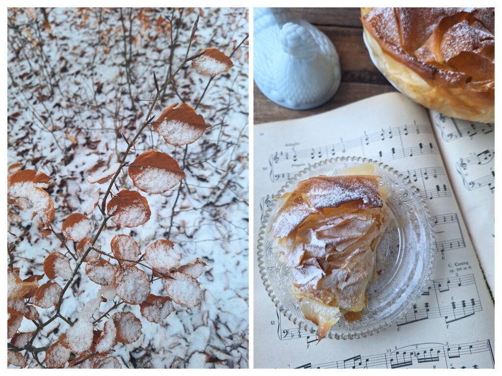 Winterzweig mit braunem Laub und ei Stück Filotorte.
