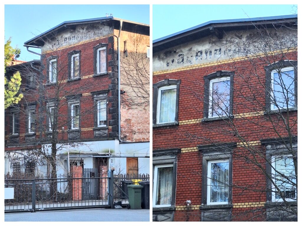 Löwenberg, deutsche Schrift auf der Hausfassade.