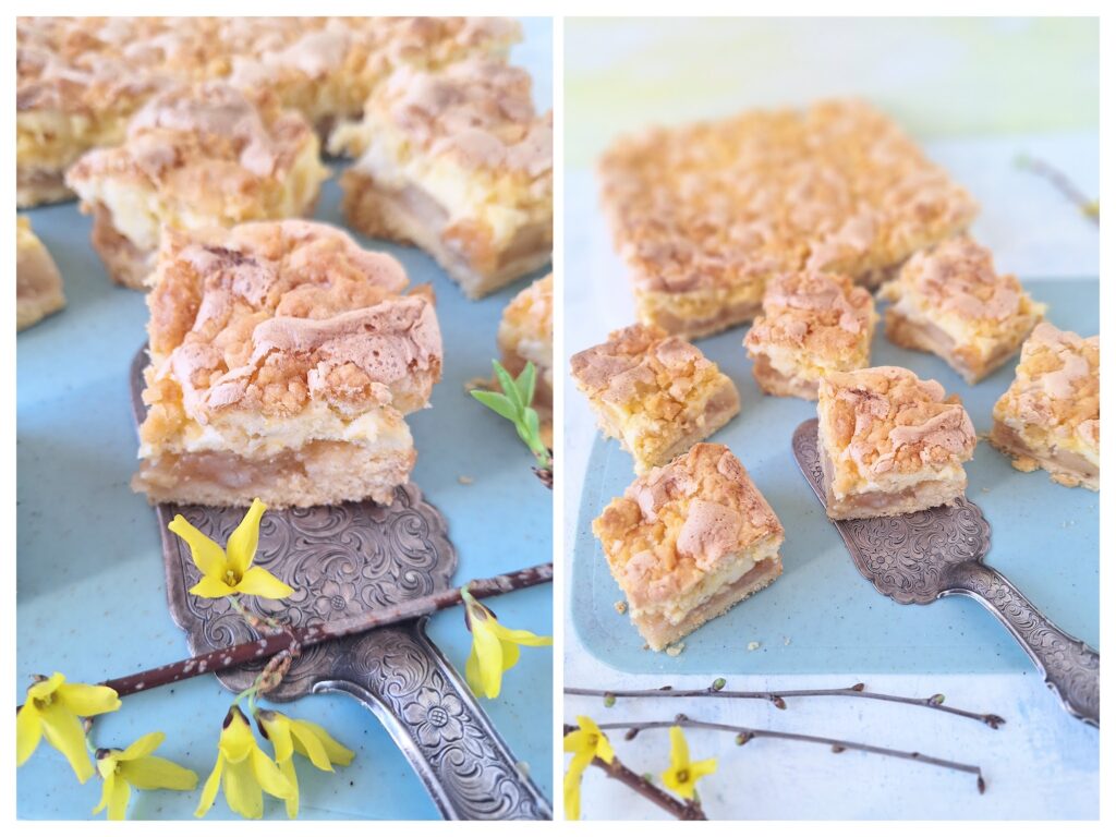 Stücke von  Streusel-Baiser-Blechkuchen mit Apfelmus und Forsythien-Blüten.