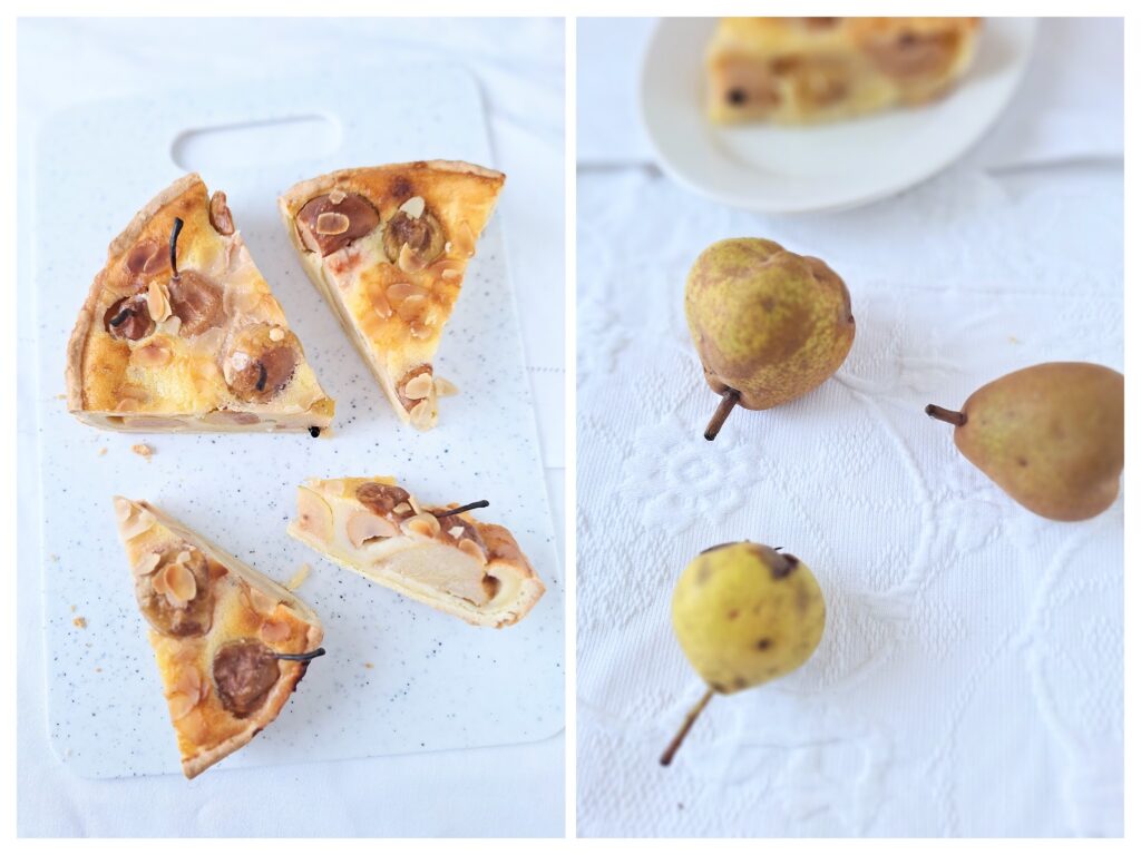 Angeschnittene Mande-Birnen-Tarte und rechts drei wilde Birnen auf dem weißen Stoff.